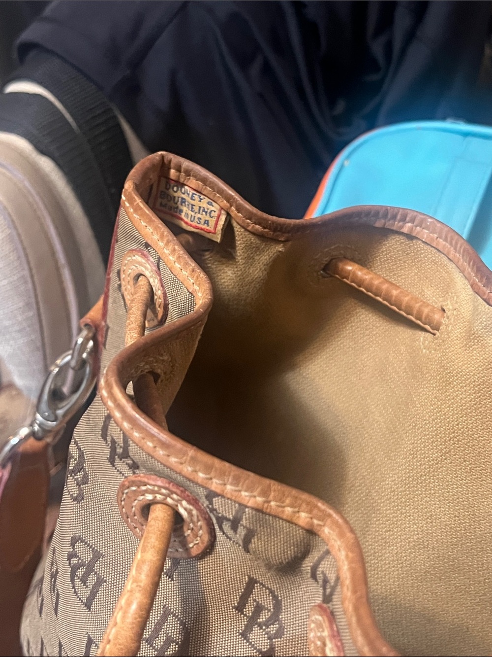 Dooney & Bourke Brown Signature Monogram Drawstring Bucket Bag